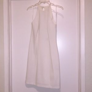 Short white dress, backless.